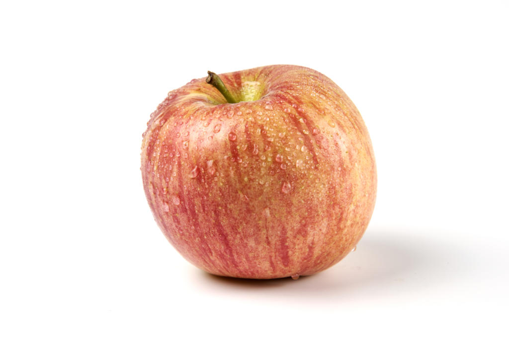 single whole red apple on white 1